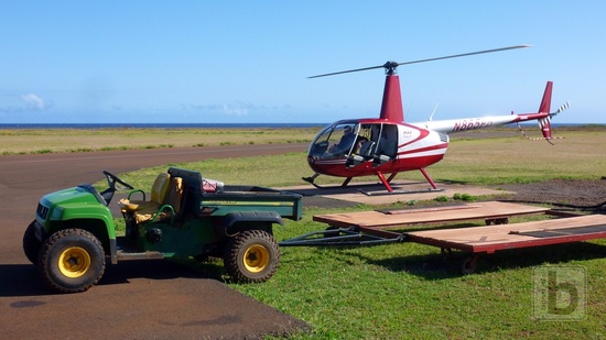 Robinson R44 (N865PB), door off